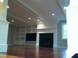 Custom Millwork, fireplace and entertainment area - home additions pelham nh