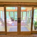 Sliding doors out to a indoor porch